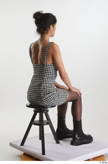 Wild Nicol 1 black boots checkered short dress dressed sitting…